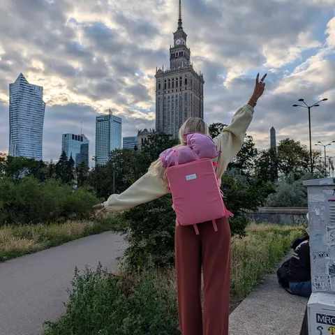 Peace out, baggage fees ✌️

Pink backpack, matching pillow, and the whole Warsaw skyline watching me travel light. The P
