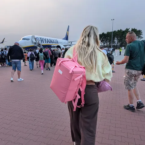 That walk across the tarmac hits different when your "personal item" is holding your entire trip 🩷✈️

Boarding a Ryanai