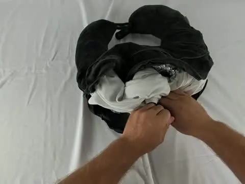 POV: your neck pillow is doing more heavy lifting than your suitcase 🖤

On-screen text: "Packing the Compression Neck P